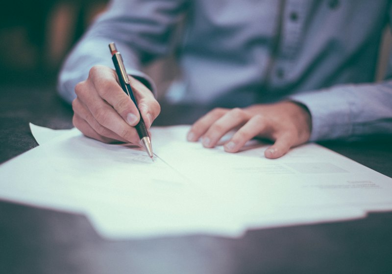 Signing an employment document